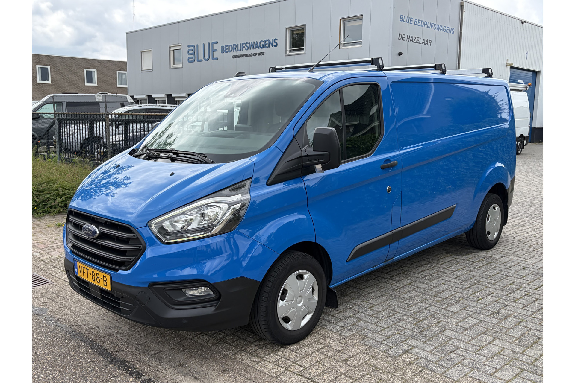 Ford Transit Custom 300 2.0 TDCI 130PK Euro6 L2H1 Trend ✓ navigatie ✓ camera ✓ trekhaak 2800KG ✓ dakdragers